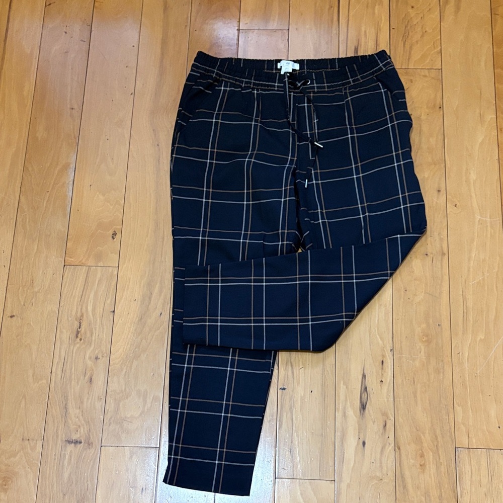 Women’s black plaid trousers